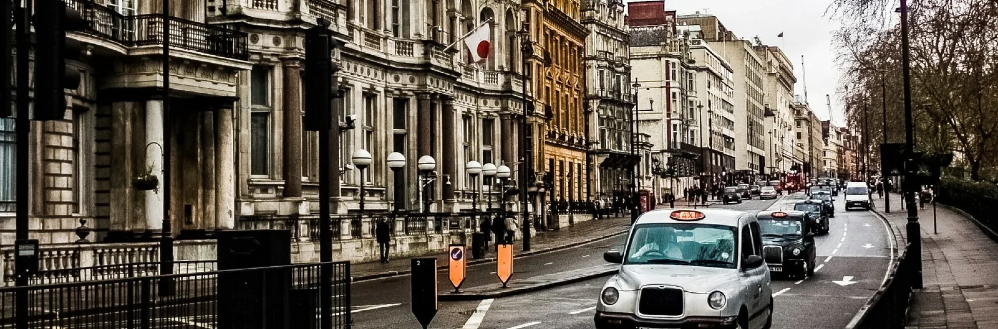 silver-car-beside-building-1837603-scaled-1